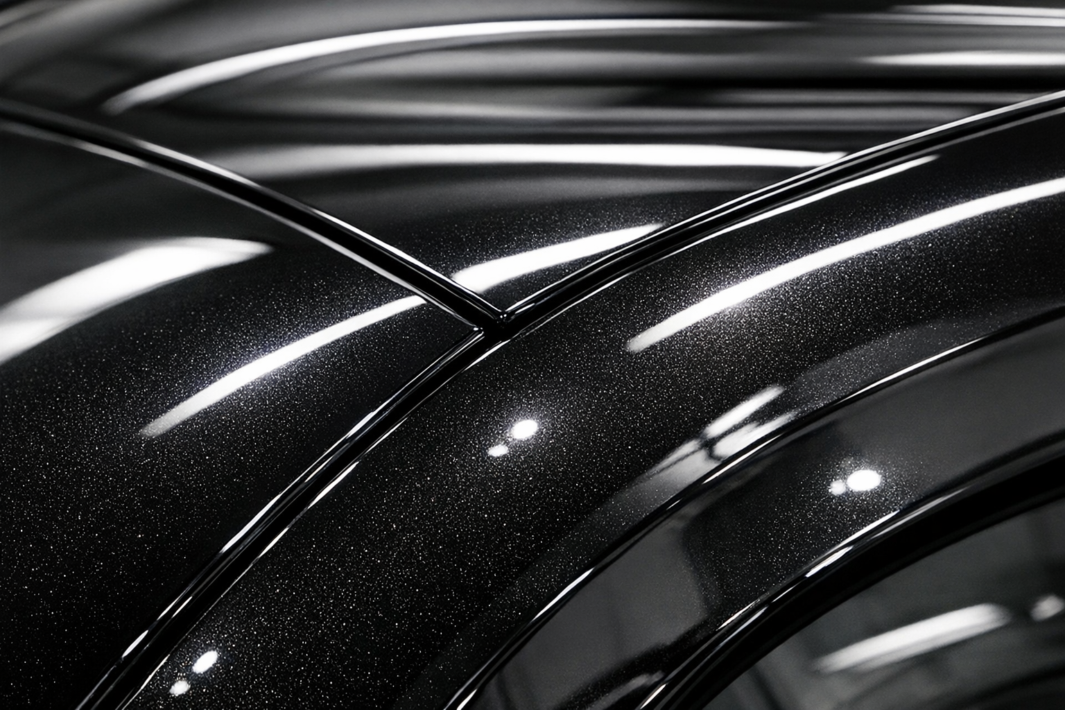 Close-up view of flawless glossy vehicle paint surface after professional correction and ceramic coating application